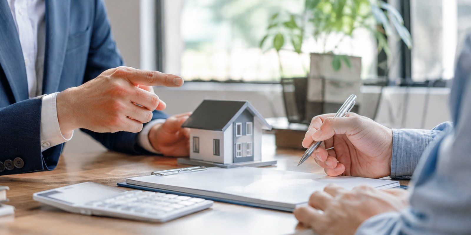 Mortgage broker discussing loan options with a client in New Zealand